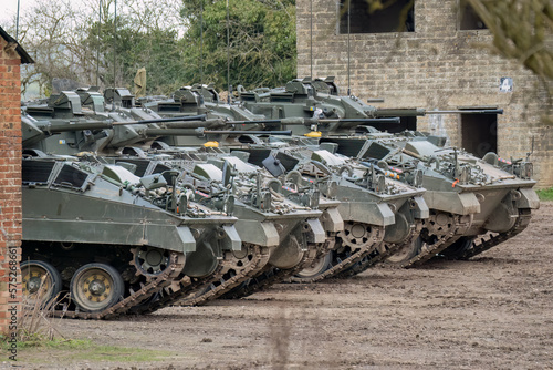 Obraz na plátne a row of five British army Warrior FV510 fighting vehicles ready for military de