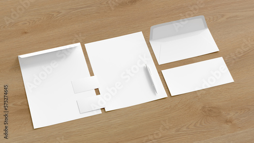 Blank corporate stationery set mockup with envelopes, business cards, paper sheet and pen on wooden background. Branding mock up. Side view
