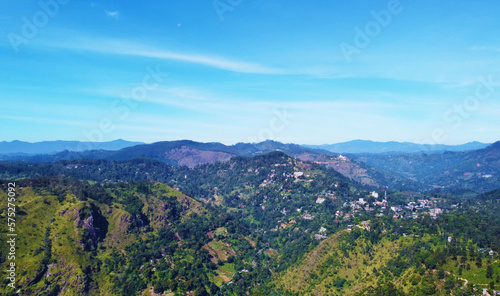 Aerial view of the mountain gorge and hills. Beautiful rock background texture for tourism and advertising. Tropical landscape from a drone © Payllik