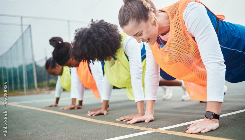 Obraz premium Sports workout, netball and happy team practice, floor push up or training for wellness athlete, people or women. Health commitment, strength performance or group fitness, challenge or exercise class