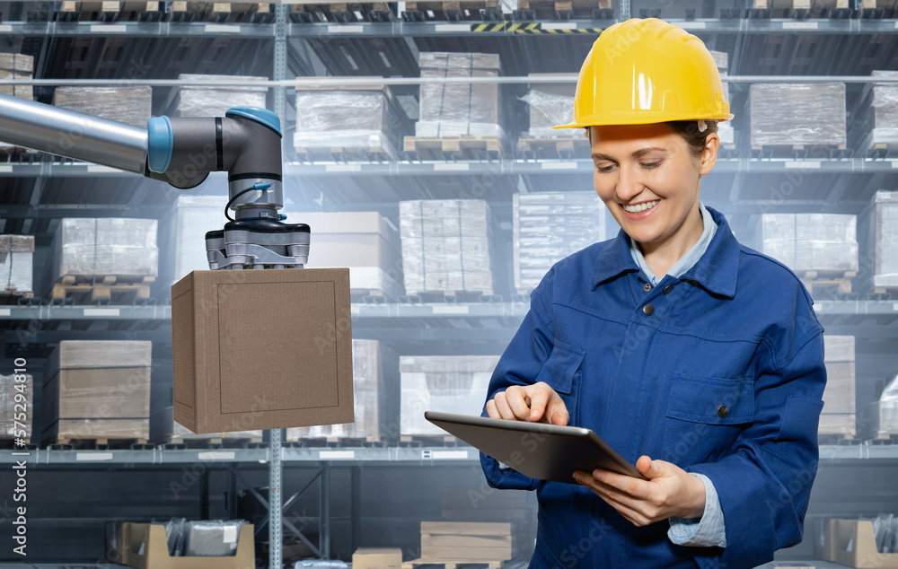 Woman manager with digital tablet n an automated warehouse with robots Woman manager with digital tablet n an automated warehouse with robots