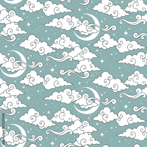 Vector seamless pattern with celestial bodies - moons, stars and clouds. Pastel hand drawn textile or wrapping design