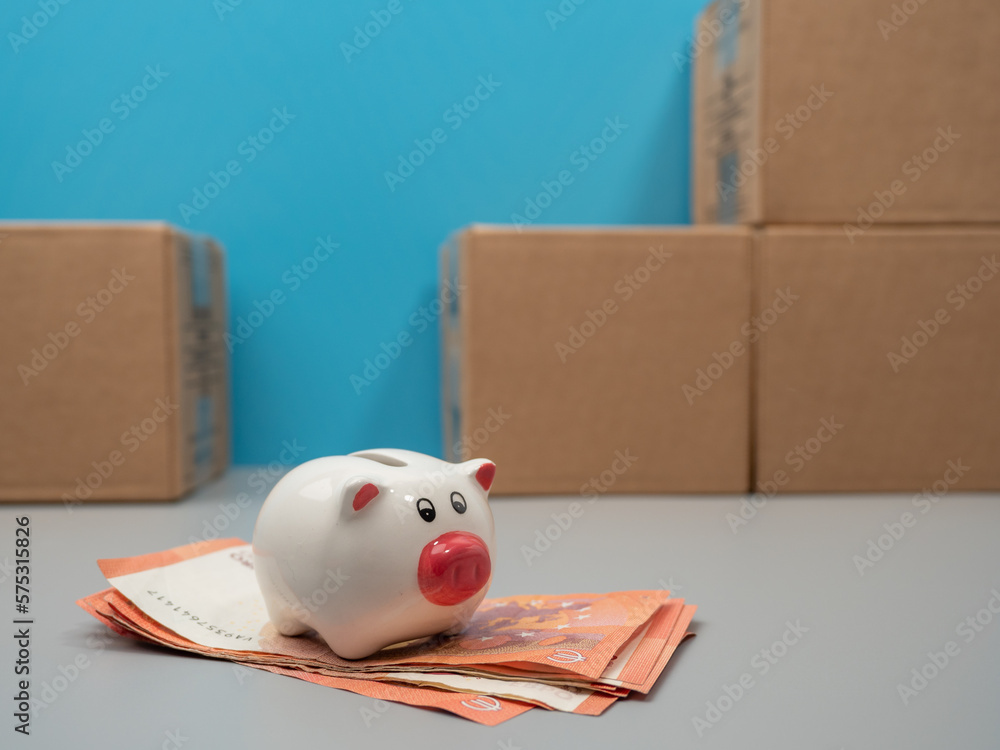 Humanitarian aid. Cardboard boxes with donations on a blue background. Close-up. Humanitarian aid. Cardboard boxes with donations on a blue background. Close-up.