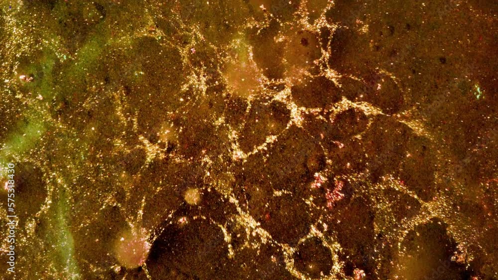 Abstract golden ink splash