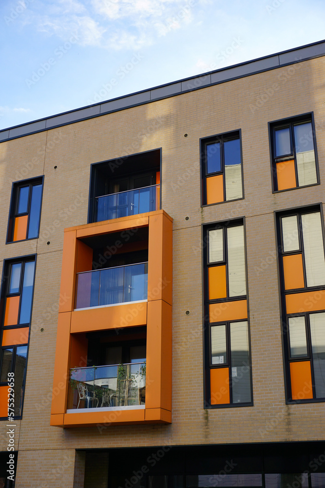 façade of colorful building in city. new modern apartment flats façade of colorful building in city. new modern apartment flats