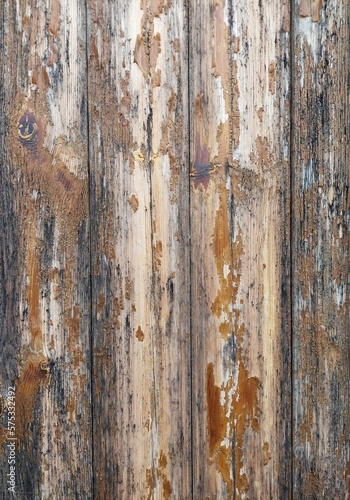 The texture of old shabby wooden wall. Wooden texture of the white wall with cracked paint. Abstract graphic.
