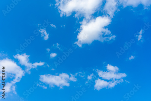 Air clouds in the blue sky. Blue sky background and white clouds. Summer blue sky. Space for free text