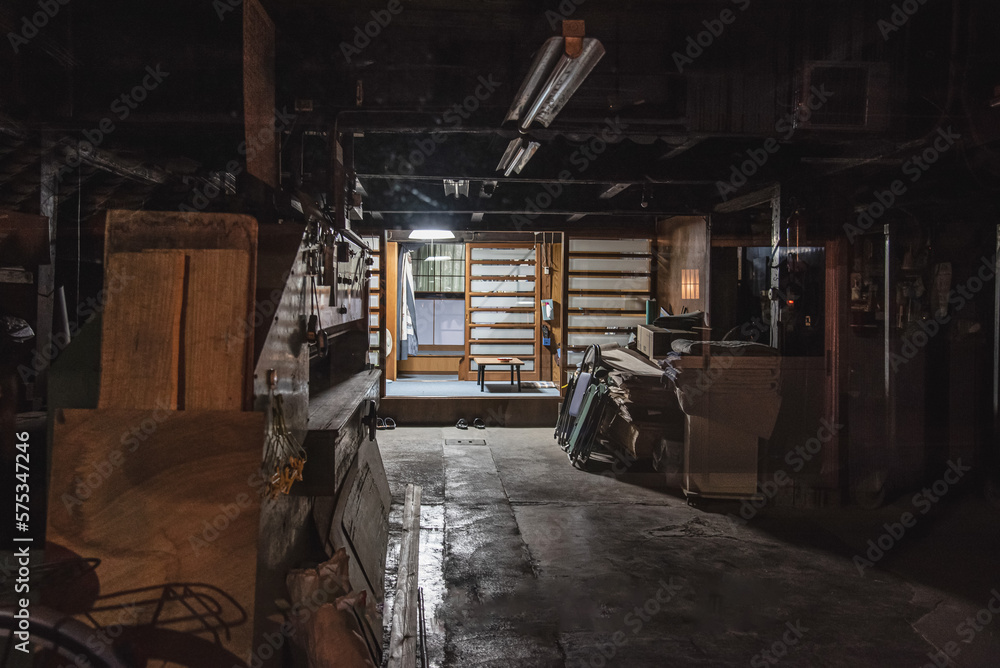 Fototapeta premium Night view of a traditional small factory in Japan