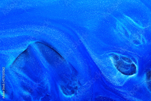 Luxury abstract background, liquid art. Blue alcohol ink with golden paint streaks, water surface, marble texture