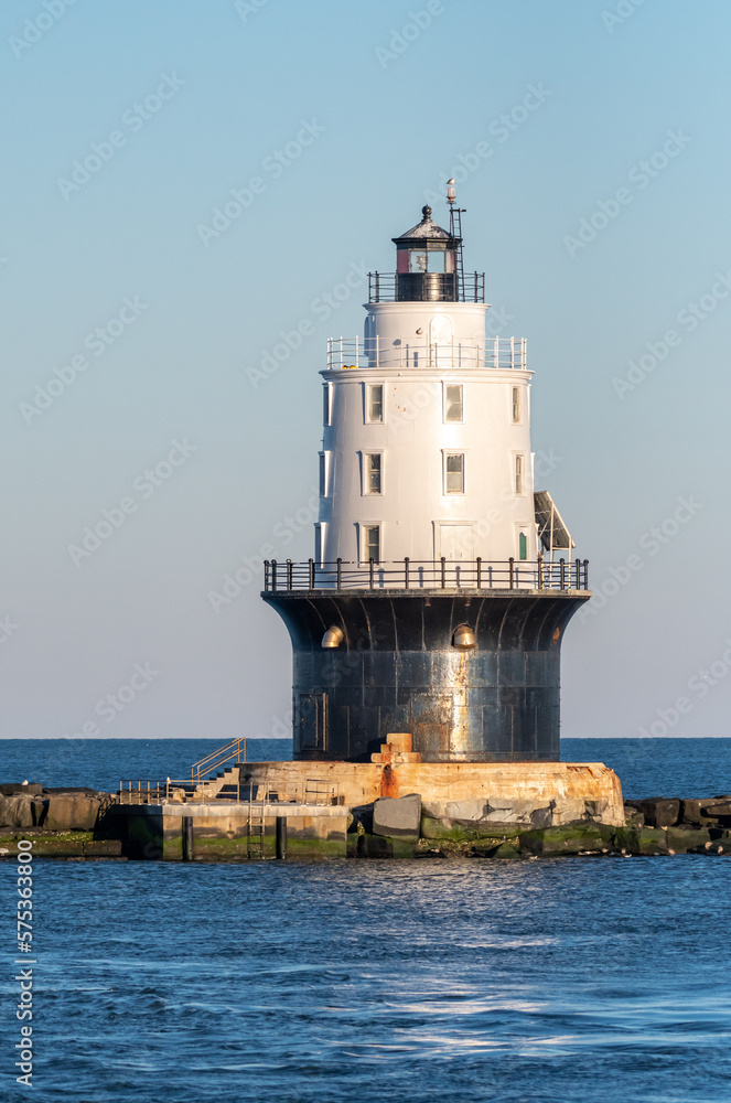 The Harbor of Refuge Light is a lighthouse built on the ocean end of the outer Delaware Breakwater at the mouth of the Delaware Bay, just off Cape Henlopen. 