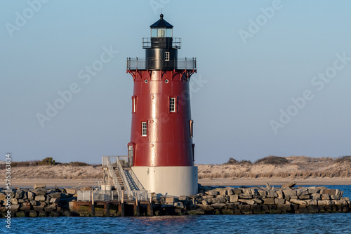 The Delaware Breakwater East End Light is a lighthouse located on the inner Delaware Breakwater in the Delaware Bay, just off the coast of Cape Henlopen and the town of Lewes, Delaware. photo