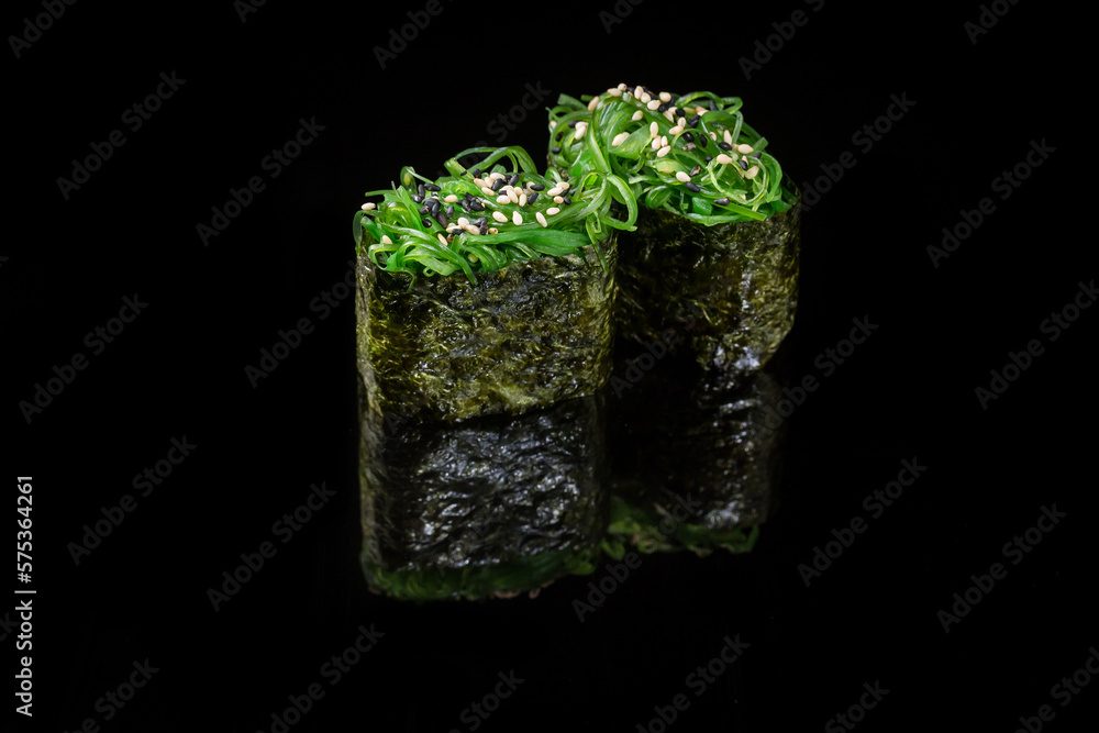 gunkan sushi with chukka and sesame seeds wrapped 
