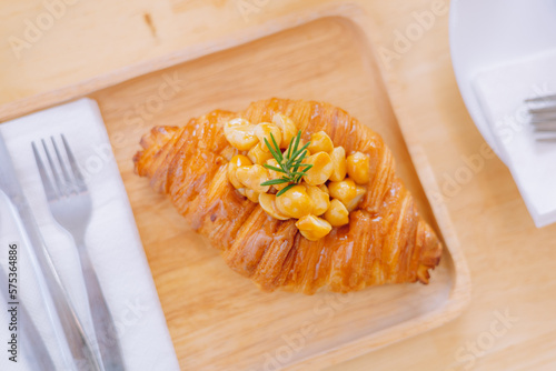 Croissant Bakery homemade on the table breakfast tray with gold and crispy