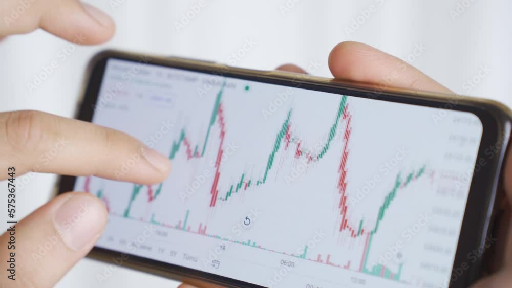 Close-up male hands searching and analyzing stock market data.
Trader, financial investor close-up hands looking at charts on phone and analyzing them.
Close-up male hands searching and analyzing stock market data.
Trader, financial investor close-up hands looking at charts on phone and analyzing them.