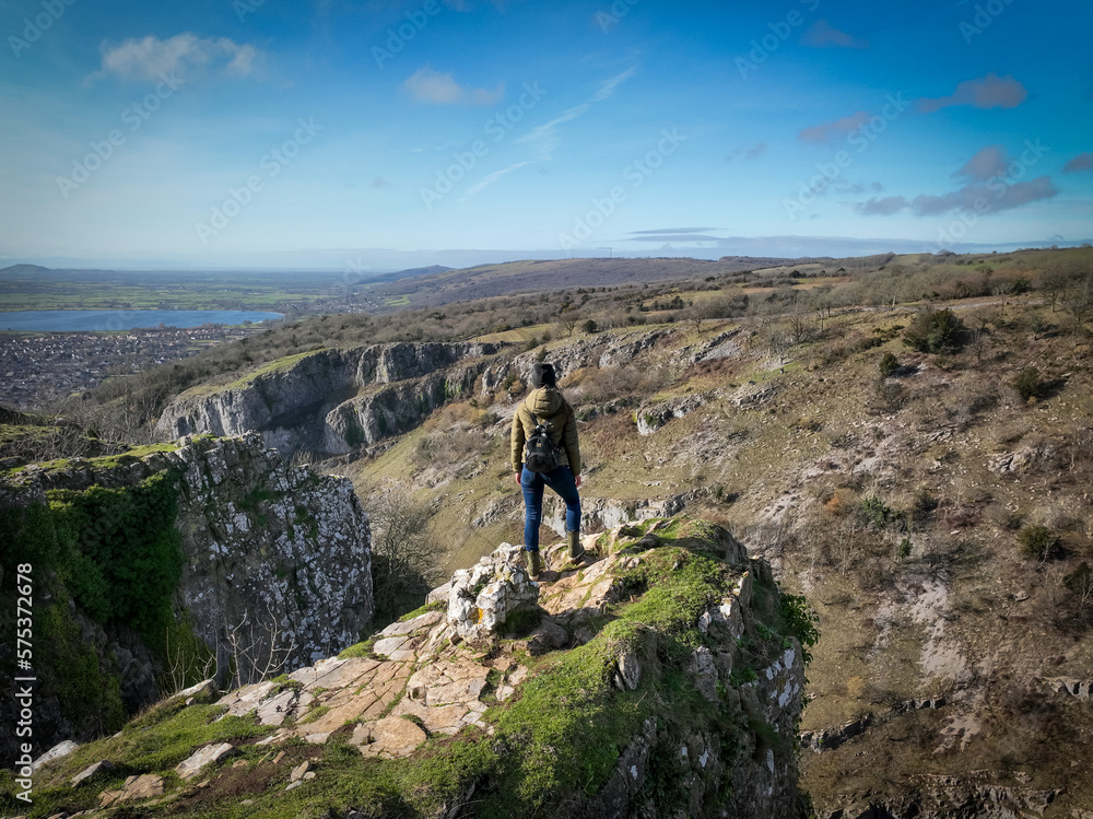 Obraz premium Cheddar Gorge. Woman on the cliff. South of England