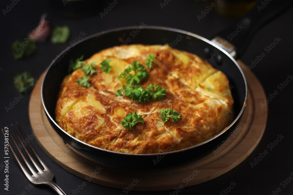 Traditional Spanish dish tortilla on the table Traditional Spanish dish tortilla on the table