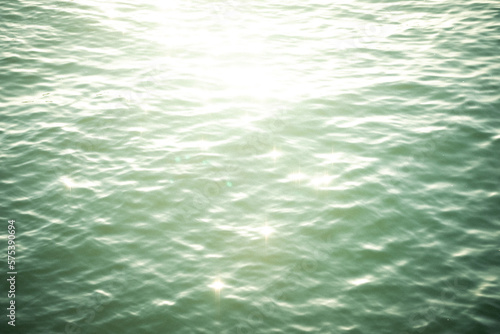 ocean water surface with sunlight and bokeh