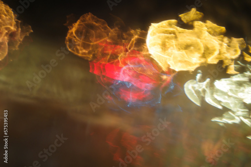 Принти на полотні Blurred Visual abstract and element of light refract from surface of glass on black background