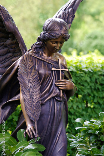Bronze grave angel with feather