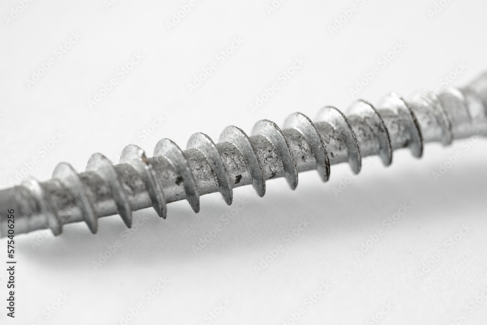 A close up of a screw on white background A close up of a screw on white background