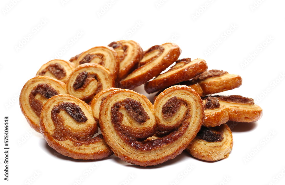 Puff pastry with butter and cinnamon isolated on white, side view Puff pastry with butter and cinnamon isolated on white, side view