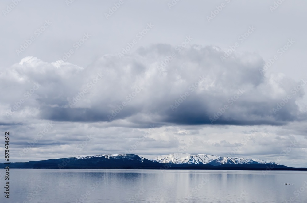 snowy mountains and dark cloud