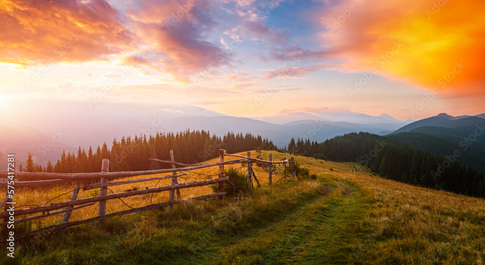 Majestic view of the sunrise over the mountain ranges. Carpathian mountains, Ukraine.