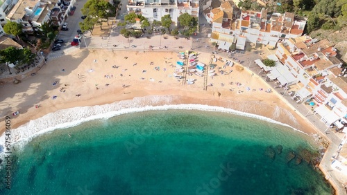 aerial view of the beautiful beach from Tamariu in a bay on the Mediterranean Sea with a promenade and a beach, Catalonia, Costa Brava, Girona, Spain