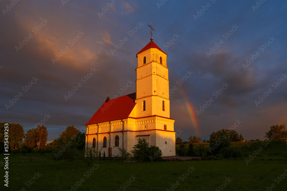 Rainbow over ancient church