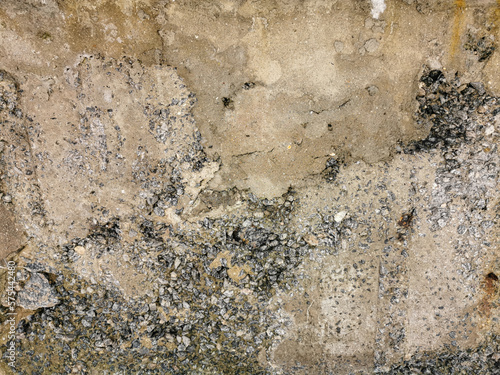 Textures. Cement wall wear on the edge of the sea. Art made by nature. Wear, algae, molluscs, lichens, wind and rain also make art.