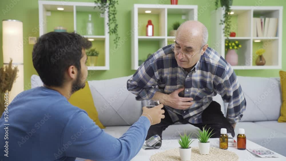 The old grandfather with Alzheimer's cannot recognize and remember his grandson who brought him water. The old grandfather with Alzheimer's cannot recognize and remember his grandson who brought him water.