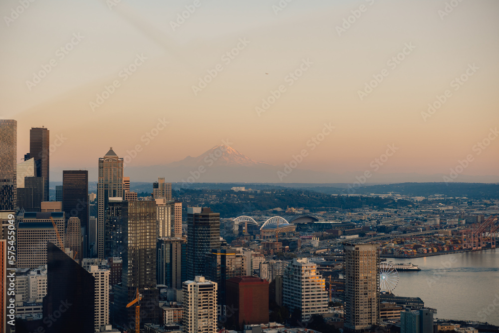View of Seattle skyline at dusk on summer evening with view of Mount Rainer, Washington State