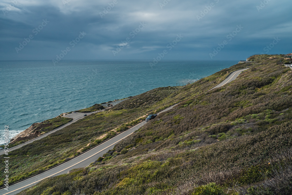 Standing on cliff overlooking looking the ocean on a cloudy day - Pacific Ocean - San Diego Cliffs