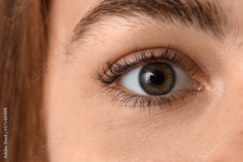 Young woman with green eyes...