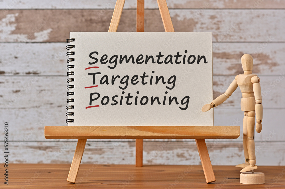 There is notebook with the word Segmentation, Targeting, Positioning