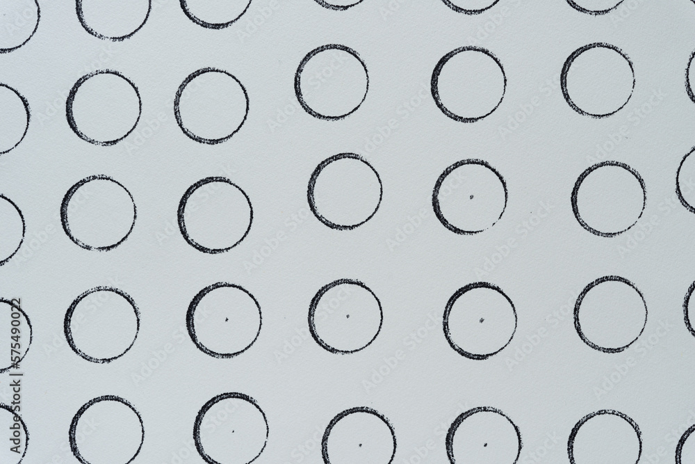 array of ink stamp circles on paper