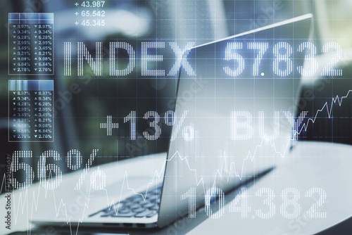 Abstract creative financial graph on modern laptop background, financial and trading concept. Multiexposure