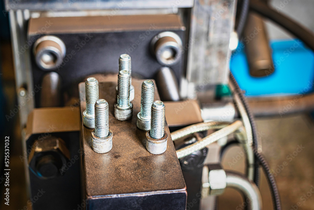 Old metal lathe in the workshop, metalworking, machine tools. Old metal lathe in the workshop, metalworking, machine tools.