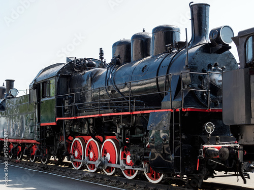 vintage black steam locomotive outdoors
