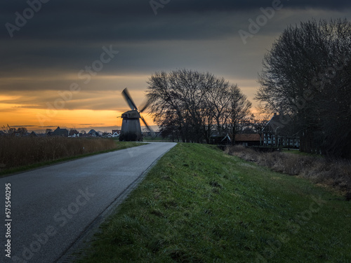 dutch windmill and sunset