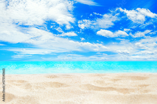 Tropical island paradise beach  green coconut palm tree leaf  sand  blue sea water turquoise ocean  sun sky white cloud  beautiful landscape  summer holidays  vacation  travel banner  empty copy space