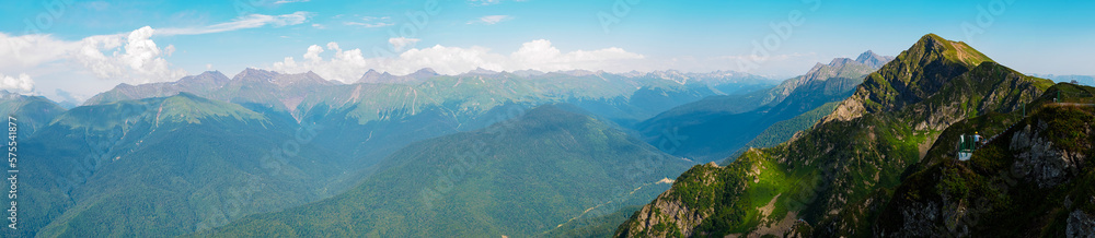 panorama: View of the Caucasus mountains at sunset in summer. Staircase in the mountains.