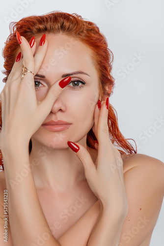 Portrait of a beautiful red-haired girl