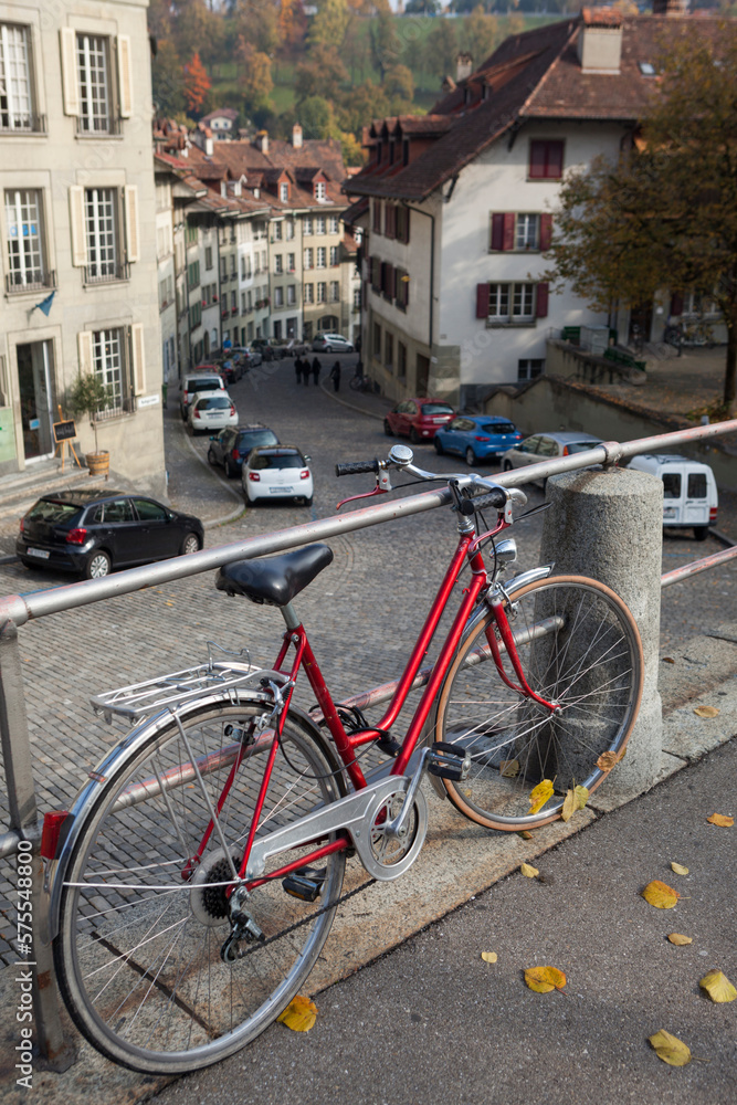 Bicycle locked to railing, Nydegasse, Bern, Switzerland Bicycle locked to railing, Nydegasse, Bern, Switzerland