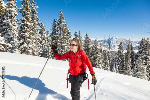 Woman skiing in winter, Mountâ€ Emmons,â€ Gunnisonâ€ National Forest, Colorado, USA photo