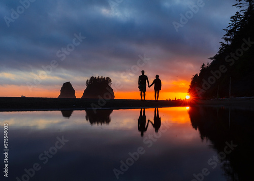 Couple at Shi Shi Beach, La Push, Washington, USA photo