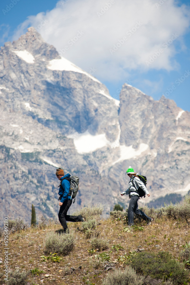 Couple hiking in mountains Couple hiking in mountains