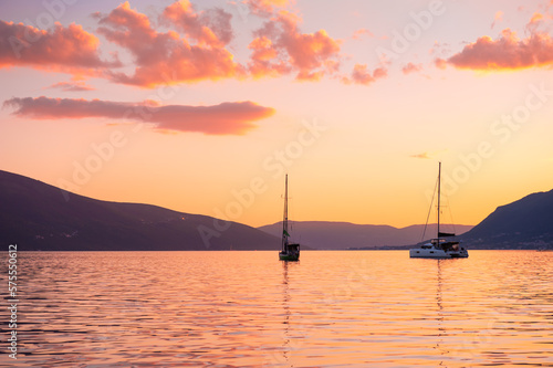 Yacht in the Kotor bay, Montenegro. Summer landscape at sunset.