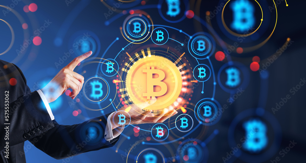 Fototapeta premium Businessman using futuristic cryptocurrency interface