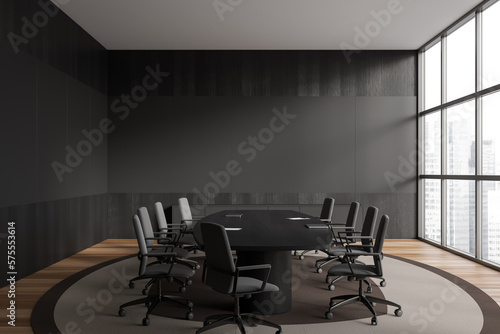 Grey business room interior with armchairs and table  window. Empty wall